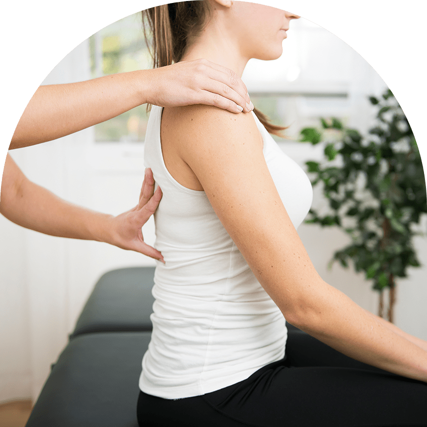 chiropractic adjustments to a woman's back